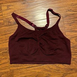 Women’s Tek Gear razor back sports bra. Size large. Light support. Never worn.